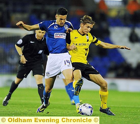 CONSTANT MENACE: Conor Wilkinson, who was impressive throughout, gives his marker a hard time. Pictures by ALAN HOWARTH
