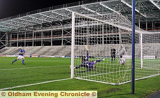 Rhys Turner scoring the winning penalty