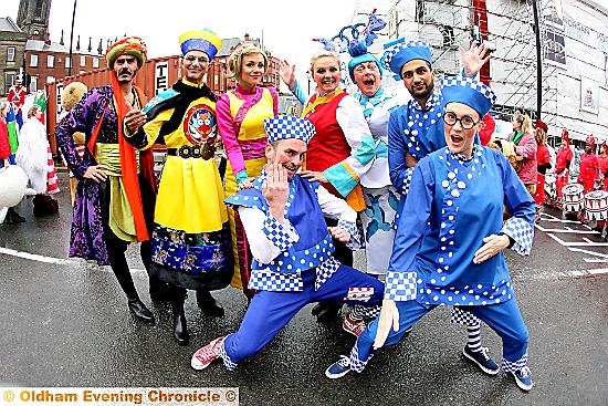 Cast members from the Coliseum’s Aladdin in the Santa parade.