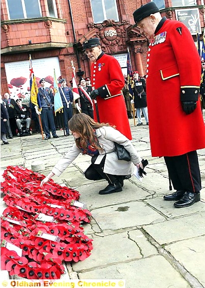 A WREATH is laid on behalf of Chelsea Pensioners John Walker and Denis Shiels at the Oldham war memorial. 