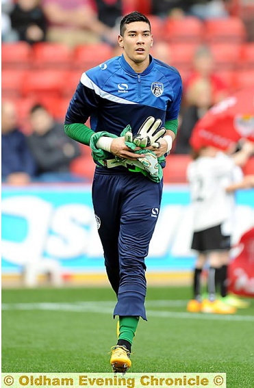 DAY JOB . . . Neil Etheridge in his role as a goalkeeper.
