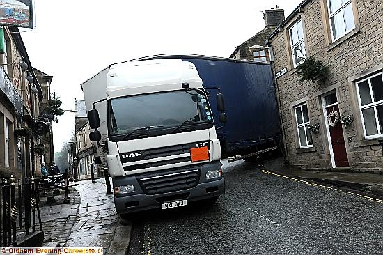 Lorry wedged at Junction of King Street and Grains Road Delph Lorry wedged at Junction of King Street and Grains Road Delph