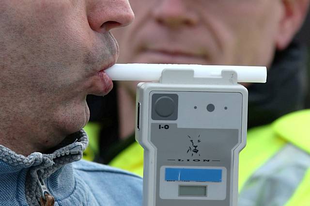 Motorist taking a breath test