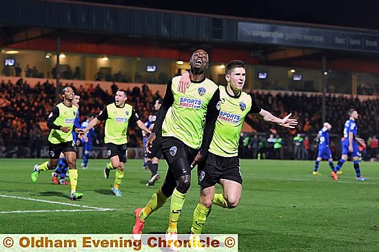 AND THAT MAKES TWO: Jonathan Forte wheels away in celebration alongside Danny Philliskirk. 