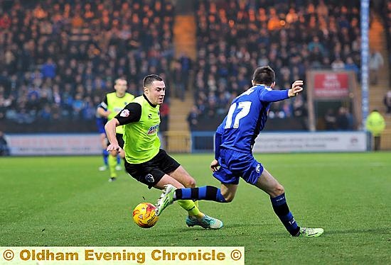 ATHLETIC midfielder Mike Jones cuts inside Rochdale’s Scott Tanser.