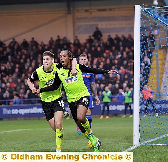 UP AND RUNNING: scorer Daniel Johnson (right) gets a hug from Danny Philliskirk after putting Athletic in front.