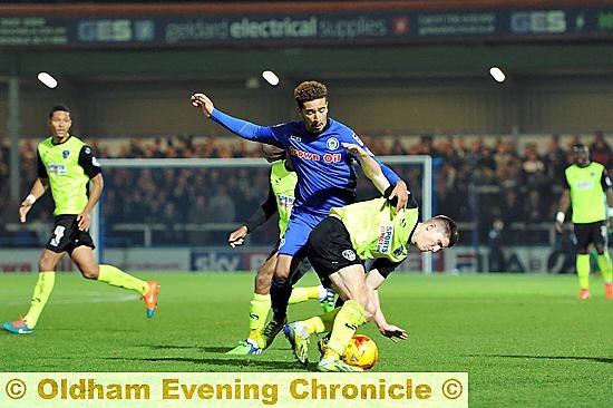IN THE THICK OF THE ACTION . . . Danny Philliskirk (left) tries to hold off his Rochdale marker
Simon Sm