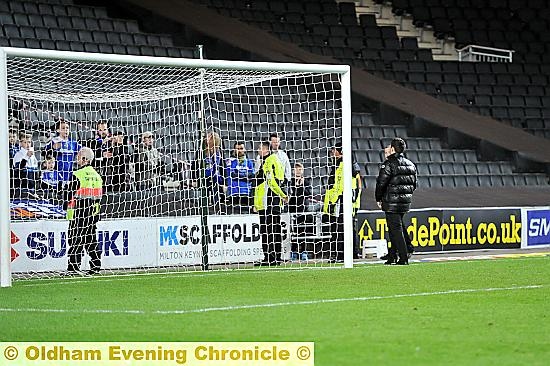 Manager Lee Johnson talking to the Latics fans after the game.
