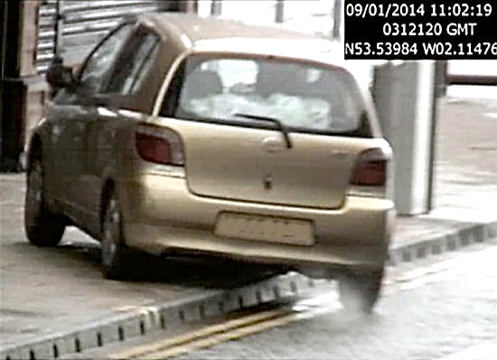 DOUBLE Whammy: this Toyota is parked on the pavement and on double yellow lines  

