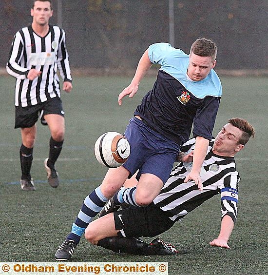 Danny Jones for Hollinwood is fouled tackling for the ball. Photo Paul Sterritt
JOHN GILDER