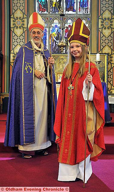 Rebecca Howarth (11) is the first youth Bishop at Oldham Parish Church pictured here with the Bishop of Manchester David Walker.