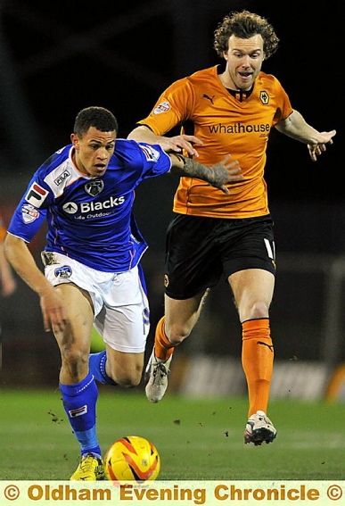 DIRECT ROUTE: Jonson Clarke-Harris heads for goal.  