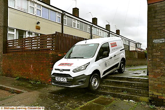 NO way through . . . the van stuck on the steps 
