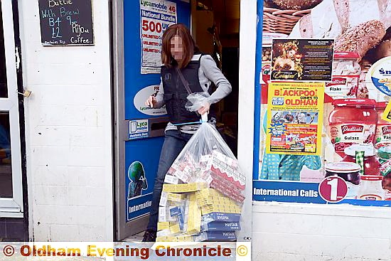 TRADING standards staff take away cigarettes confiscated in the raid on the Polski Sklep convenience store on Yorkshire Street
TRADING standards staff take away cigarettes confiscated in the raid on the Polski Sklep convenience store on Yorkshire Street