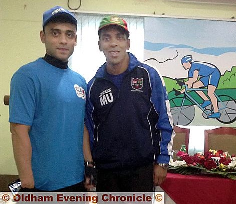 SADDLE up! Pictured are North Chadderton School teacher Arif Mohin (left) and former Oldham councillor Mohib Uddin before the start of the Tour de Sylhet in Bangladesh yesterday 
