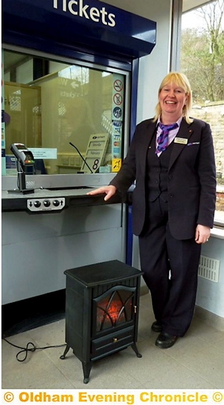 WARM welcome . . . Richelle Walsh has installed an electric fire in the waiting room of Saddleworth station
WARM welcome . . . Richelle Walsh has installed an electric fire in the waiting room of Saddleworth station