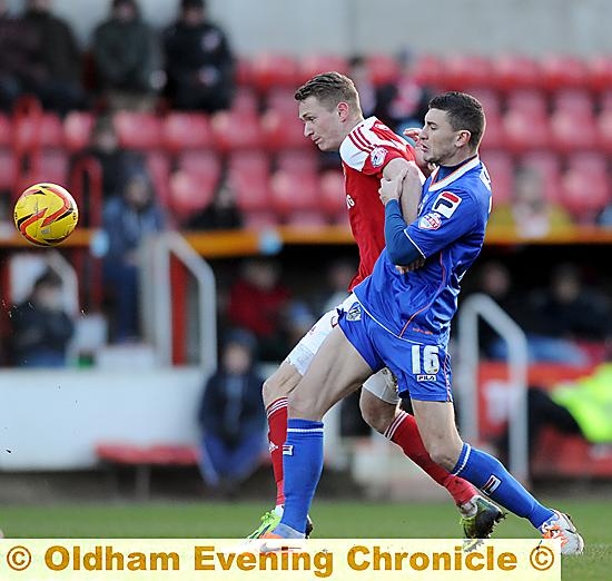 NEW FACE: James Wilson made an excellent debut in the heart of the Athletic defence. 
