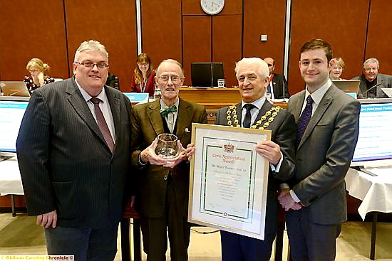 Roger Tanner MBE receives the Civic Appreciation Award 2014 from the Mayor of Oldham, Councillor John Hudson. Pictured with them are Liberal Democrat leader Councillor. Howard Sykes (left), and Councillor Jim McMahon, leader of Oldham Council
Roger Tanner MBE receives the Civic Appreciation Award 2014 from the Mayor of Oldham, Councillor John Hudson. Pictured with them are Liberal Democrat leader Councillor. Howard Sykes (left), and Councillor Jim McMahon, leader of Oldham Council