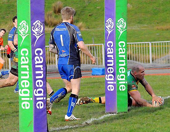 Josh Crowley touches down against Egremont Rangers. 
