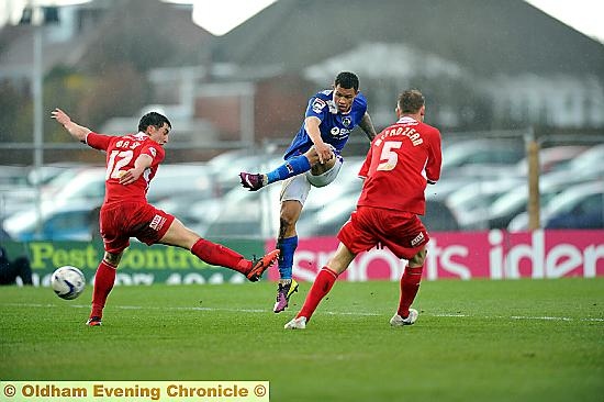 HANDFUL . . . Jonson Clarke-Harris (above) gets in a shot during his all-action performance. 