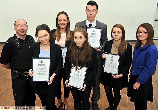 TOP class . . . (from left) PC Ian McDonald, Meg Glendinning, Natalie Hulme, Nicole Hankes, Louis Gilligan and assistant head teacher Adelle Greenwood 
