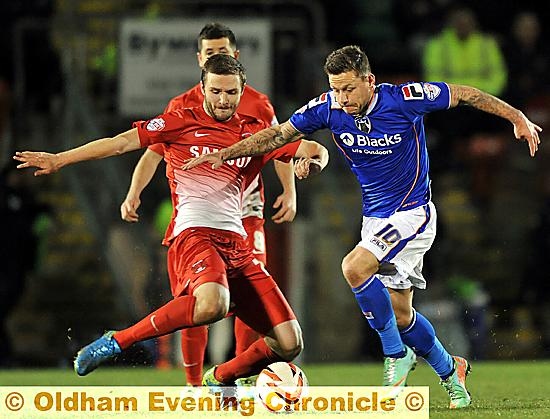 ACTION MAN . . . Charlie MacDonald runs at the Orient defence. 