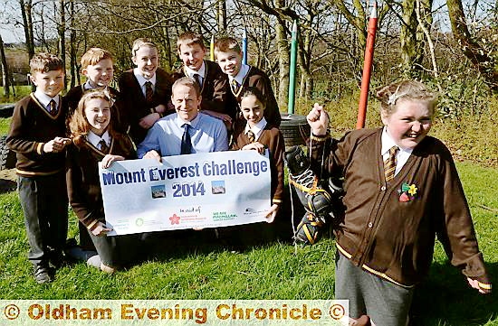 MARATHON man Steve Hill with pupil Megan Kinghorn (front) and pupils (from the left) Keaton Wright, Orla Jackson, Daniel Race, Chloe McCullough, Declan Finigan, Sam Heaton and Imani Raza 
