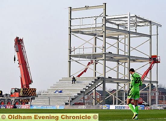 ROOM FOR ONE . . . pictured during Saturday’s home match against Brentford, the new North Stand starts to take shape. 