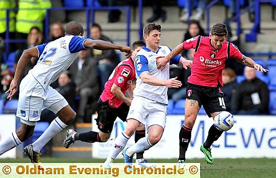 ATTACKING INTENT: Charlie MacDonald tries to get things moving for Athletic. 