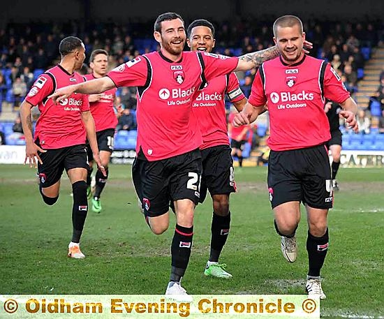 JAMES Wesolowski (right) is joined by David Worrall (left) in celebrating Athletic’s opening goal at Tranmere. 
