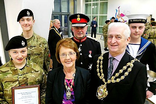 PROUD: Oldham cadets recognised for doing their bit for the Poppy Appeal. Back row, left to right: leading cadet Ashley Lockwood of Oldham Army Cadet Force, Colonel Warren J Smith, leading sea cadet Luke Norton. Front row, left to right: cadet Summer Scales of Oldham Army Cadet Force, Oldham Mayoress Kathleen Hudson and Oldham Mayor Councillor John Hudson 
