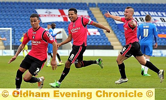 WHAT A FEELING . . . Connor Brown celebrates the winning goal he created, along with his skipper. Korey Smith. 
