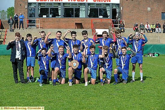 WINNERS SMILES . . . captain Ross Crawford fronts his successful Saddleworth Year 10 team.