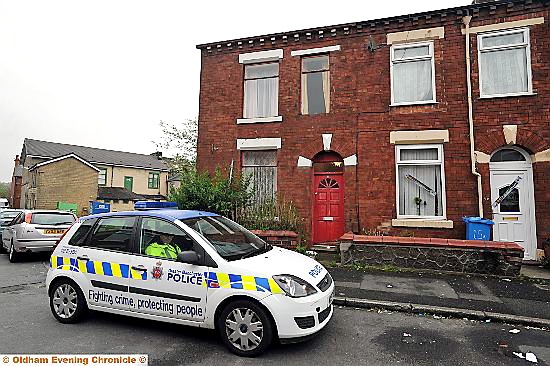 AT the scene . . . on South Hill Street, where the body was found 

