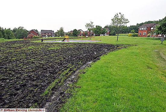 PLOUGHED . . . The muddy area that has replaced the green space at Wendlebury Green.