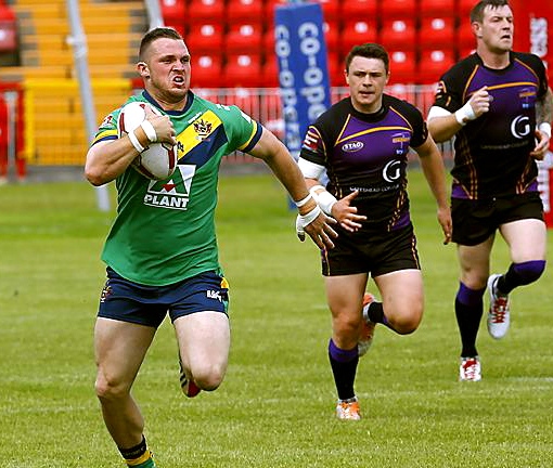 EARS PINNED BACK: Full-back Steven Nield makes a break for the line for Oldham at Gateshead yesterday. 
