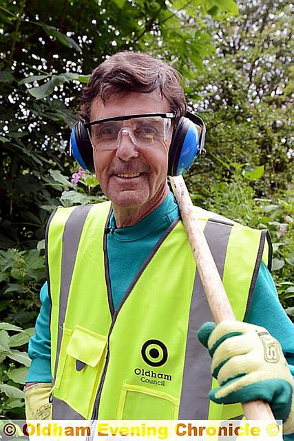 TV presenter and former road worker John Stapleton returns to his roots filling in potholes in Delph.