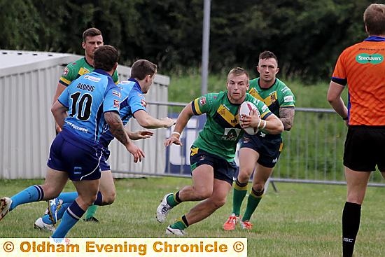 FLEETING JOY: David Cookson runs in for an Oldham try. 
