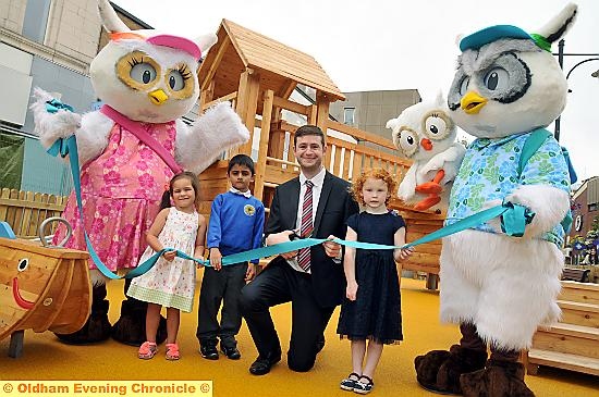 Town Centre play area opening by Cllr Jim McMahon with with (l-r) Millie, Freya Reed (4),Billy Yasin(6),Scarlett Moore(5) and Ollie.