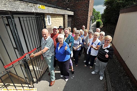 High Crompton Park gets its toilets back for the crown green bowlers. (front) L-R: David Hickling (Secretary of Men's Section) and Joan Leech (Retiring Secretary of Women's Section).