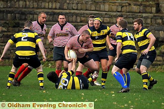 Oldham RU’s John Souter makes ground