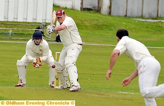 FIRMLY FOCUSED . . . Werneth’s Matt Taylor takes guard in the derby clash against Royton.