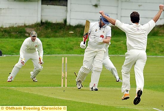 HE’S GONE . . . Royton’s Adam Good celebrates bowling out Werneth’s Levi Thompson-Matthews.
