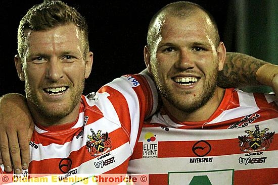 REASONS TO BE CHEERFUL: Dale Bloomfield (left) and drop-goal hero Josh Crowley are pleased as punch after Oldham RL’s defeat of Hunslet Hawks. 