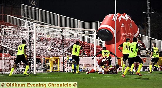 IT’S THERE: Amari Morgan-Smith (number 27) fires home Athletic’s equaliser against Swindon Town last night. 