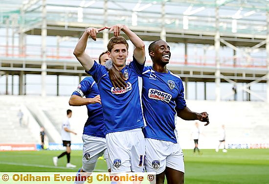 SIGN LANGUAGE: Danny Philliskirk produces his goal celebration after ending his scoring drought