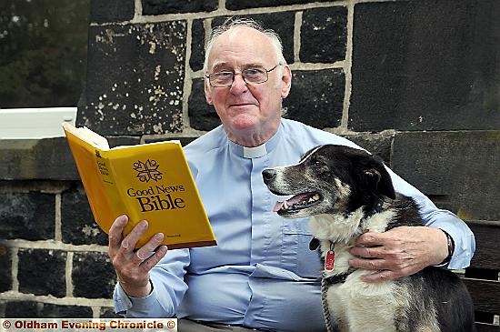 BORDER collie Nell joins the Rev Rhodes in a reading from the bible at a special service for pets. BORDER collie Nell joins the Rev Rhodes in a reading from the bible at a special service for pets.
