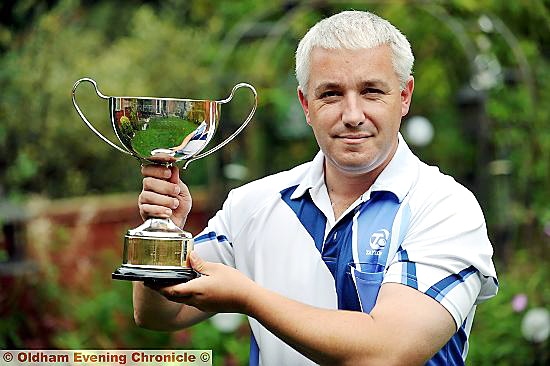 GARY Ellis shows off the Waterloo Handicap trophy, but he was unable to add the BCGBA Champion Of Champions title to this year’s roll of honour. 
