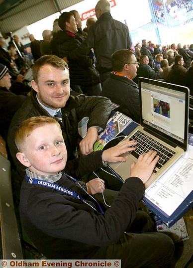 Reegan Moss (10) Latics webmaster for the day alongside the club’s usual web wizard Luke Ingram.