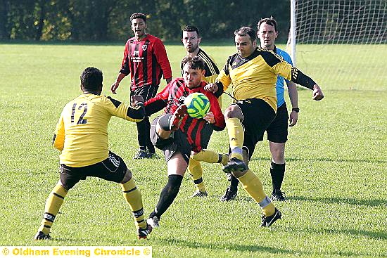 GOING FOR IT: Limeside King George’s Will Buckley (centre) is challenged by two Coppice players. GOING FOR IT: Limeside King George’s Will Buckley (centre) is challenged by two Coppice players.